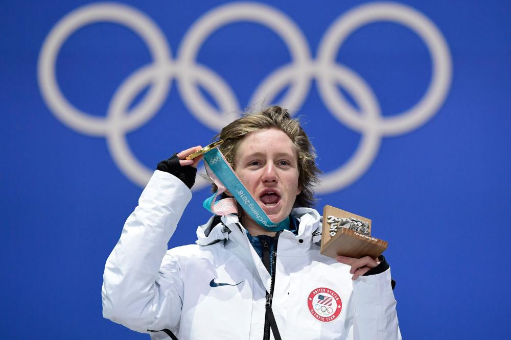 Redmond Gerard of the US poses on the podium during the medal ceremony for the snowboard men’s Slopestyle at the Pyeongchang Medals Plaza of the Winter Olympic Games Sunday. — AFP 