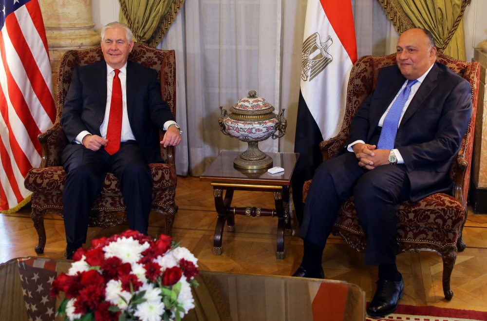 Egyptian Foreign Minister Sameh Shoukry (R) meets with US Secretary of State Rex Tillerson  (L) in Cairo on Monday. — AFP