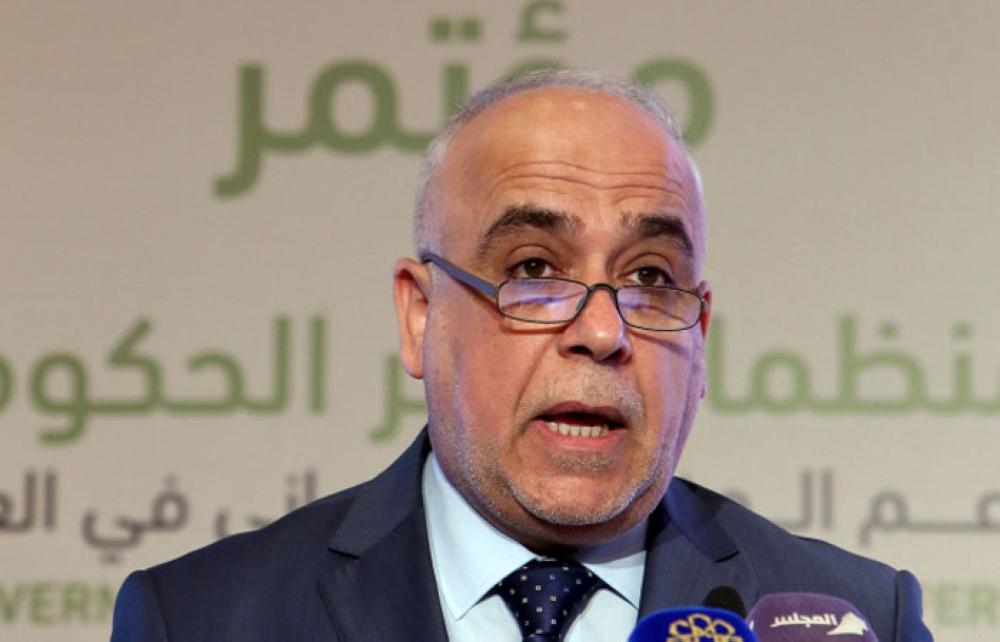 AbdulKarim Al-Faysal, special adviser to the Iraqi Prime Minister, speaks during the Kuwait International Conference for Reconstruction of Iraq in Kuwait City on Monday. — AFP