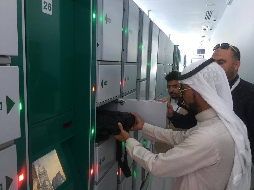 Visitors all praise for luggage locker service outside Grand Mosque