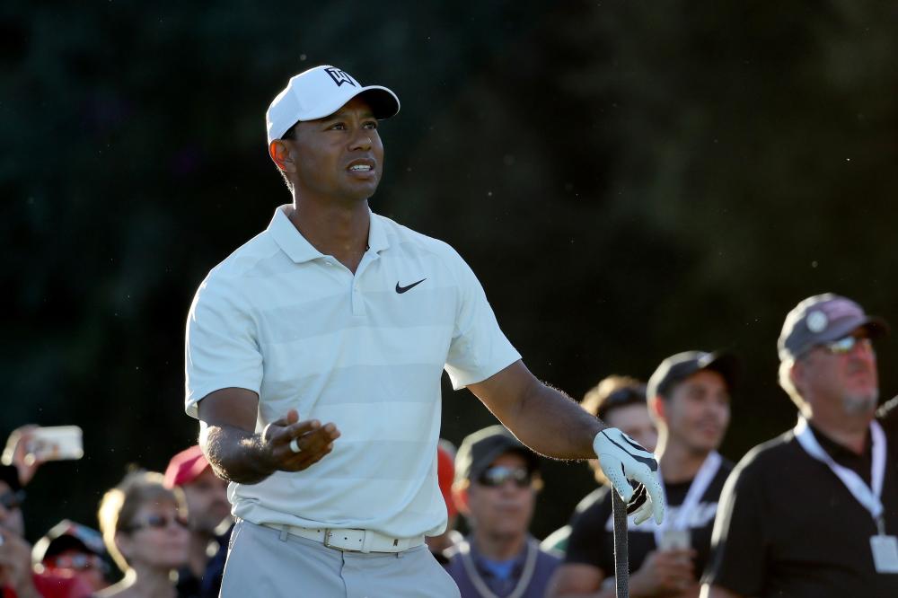 Tiger Woods reacts to his shot from the 17th tee during the second round of the Genesis Open at Riviera Country Club in Pacific Palisades, California, Friday. — AFP