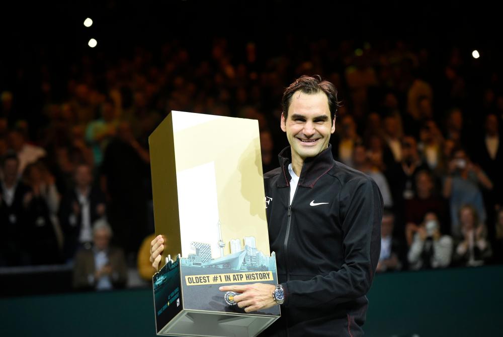 TOPSHOT - Switzerland's Roger Federer celebrates after victory over Netherlands Robin Haase in their quarter-final singles tennis match for the ABN AMRO World Tennis Tournament in Rotterdam on February 16, 2018.  / AFP / JOHN THYS                 

