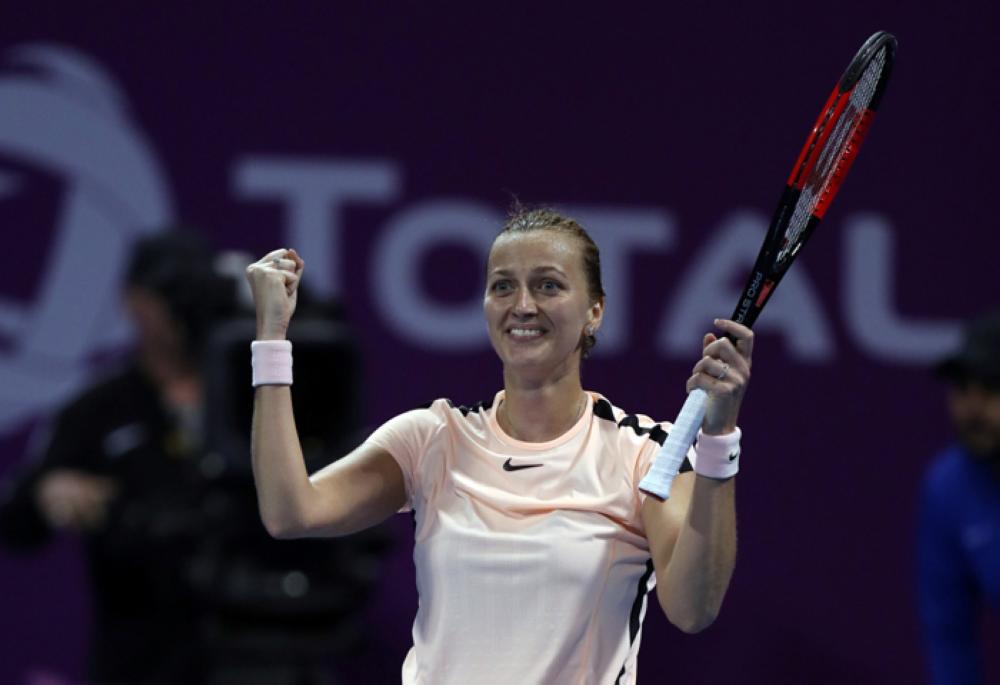 Petra Kvitova of Czech Republic celebrates after defeating Caroline Wozniacki of Denmark. — Reuters