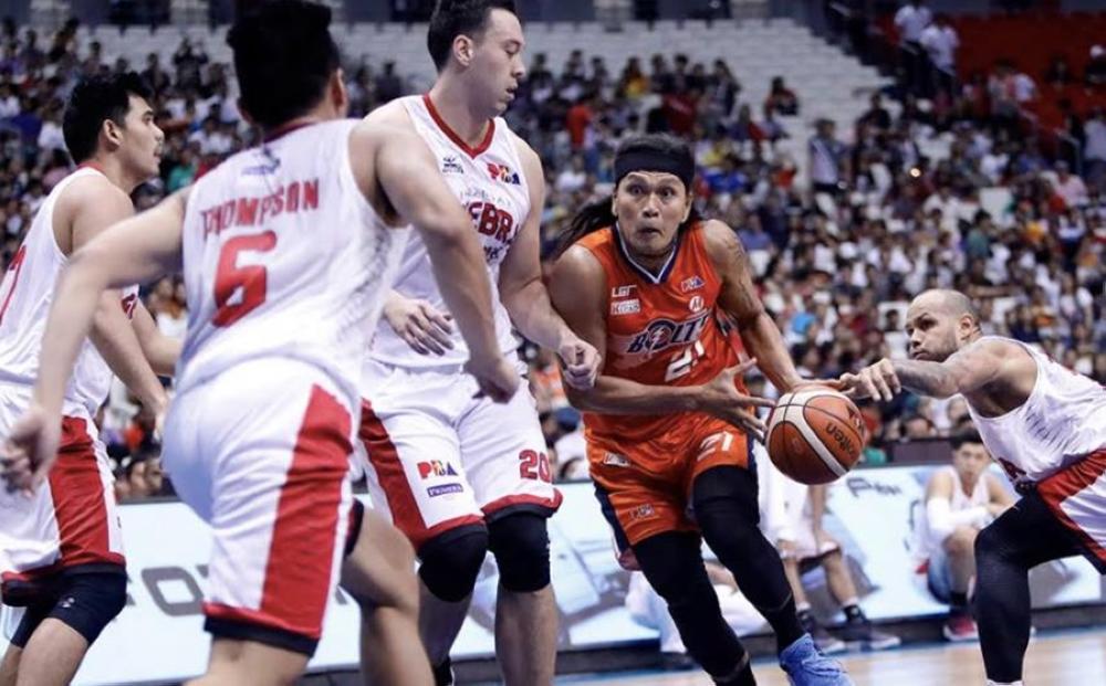 Meralco stuns Ginebra on Ballesteros’ heroics