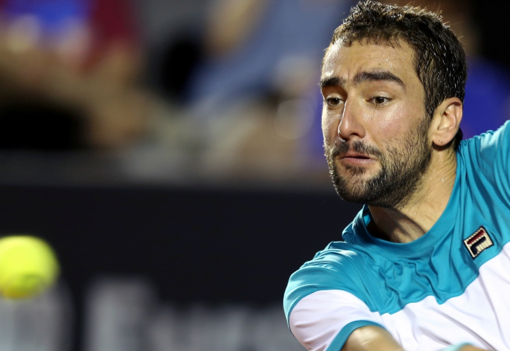 Marin Cilic of Croatia in action against Carlos Berlocq of Argentina at the ATP 500 - Rio Open 1st round in Rio de Janeiro, Brazil, on Monday. — Reuters