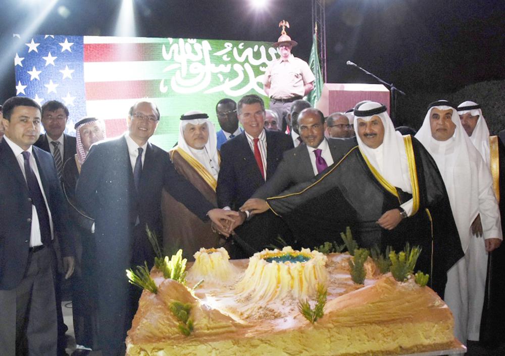 Consul General Mitman, Ambassador Jamal Balkhoyour, and dignitaries from the diplomatic corps gathered for the cake cutting ceremony at the U.S. Consulate General Jeddah. 
