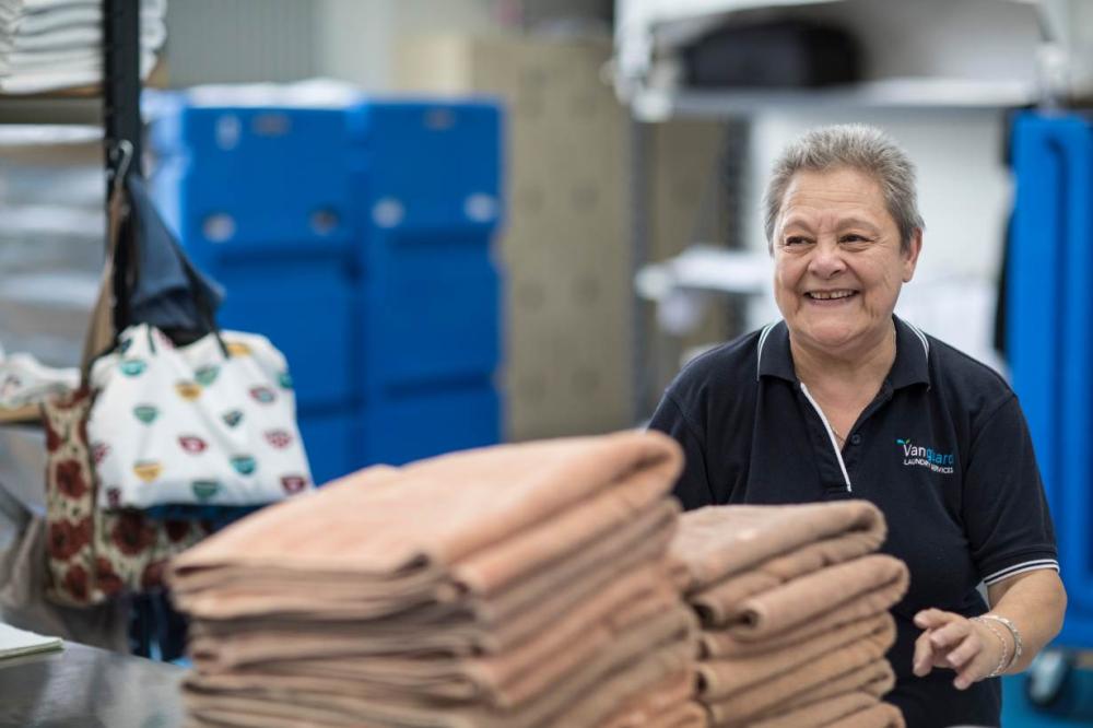A worker at the Vanguard Laundry in Toowoomba, Australia. Across the globe, a growing number of entrepreneurs are setting up companies to tackle social challenges, ranging from reducing isolation among the elderly to improving communities and breaking the cycle of reoffending. - Thomson Reuters Foundation