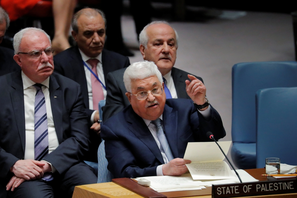 Palestinian President Mahmoud Abbas speaks during a meeting of the UN Security Council at UN headquarters in New York, Tuesday. — Reuters