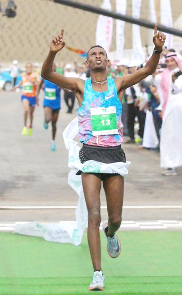 Saudi and expat runners take part in the 2018 Riyadh marathon at the King Saud university in Riyadh on Saturday. — AFP