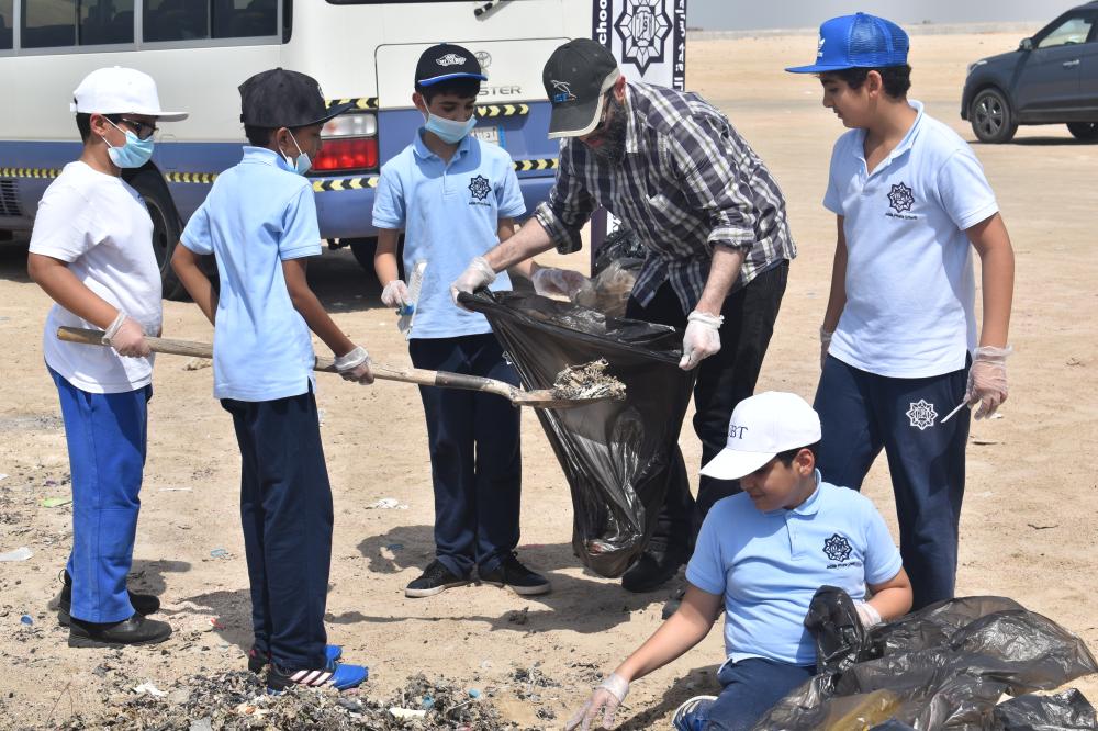 Elementary pupils lend a hand to clean up Salman beach