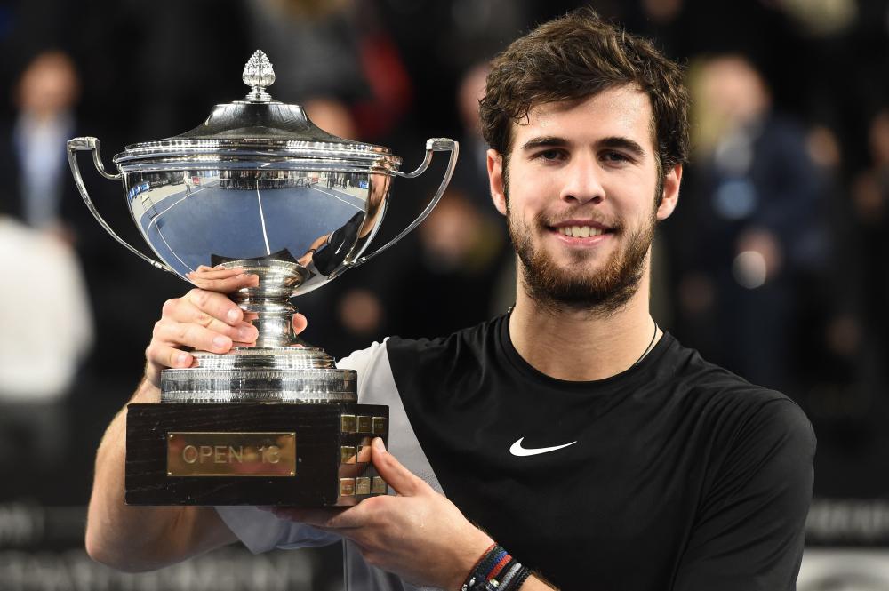 Karen Khachanov of Russia poses with the trophy after beating Lucas Pouille of France in the final of the ATP Marseille Open 13 Provence Tennis Tournament in Marseille Sunday. — AFP