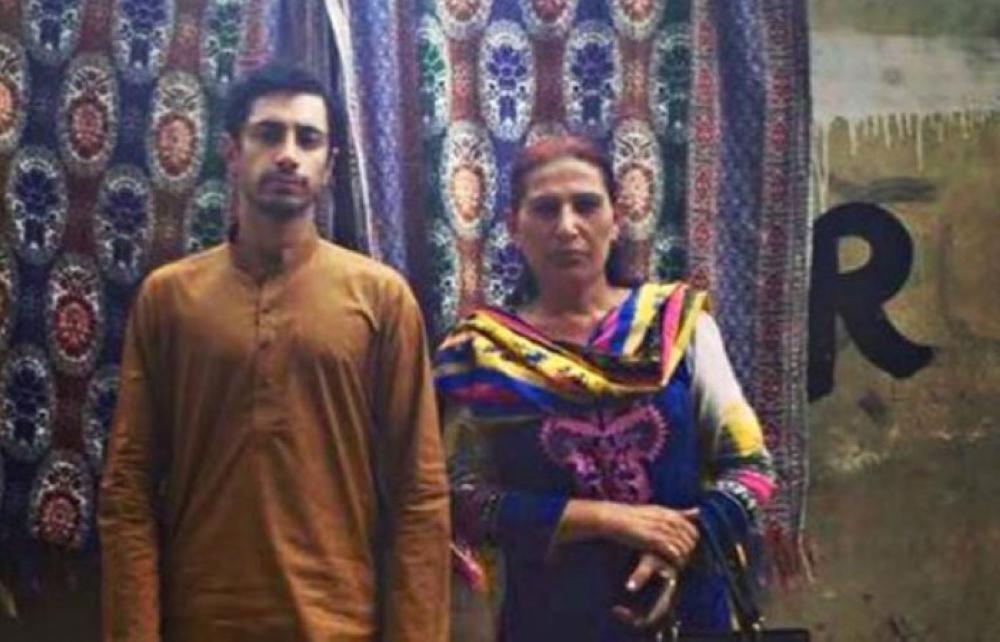 Actor Riz Ahmed poses with a member of the transgender community in Karachi, Pakistan in this photo taken from his Instagram account.