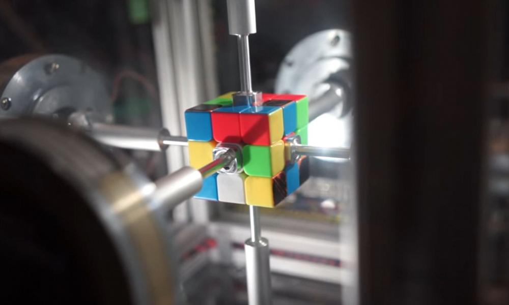 A screen grab of the astonishing moment a robot solves a Rubik's cube in 0.38 seconds.