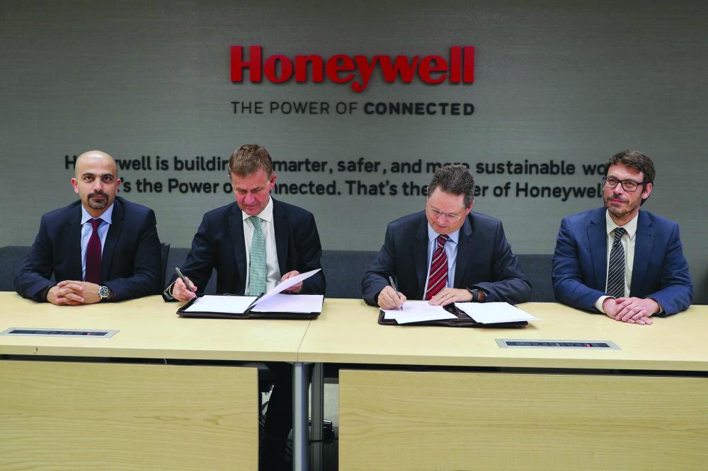 Erik Solheim, executive director, UN Environment, and Norm Gilsdorf, president, Honeywell high growth regions, Middle East, Russia, Turkey, and Central Asia, at the MOU signing. — Courtesy photo