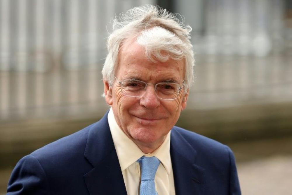 Britain's former Prime Minister John Major attends a Commonwealth Day Service at Westminster Abbey in central London on March 12. The conditions street children live in round the world is 'unforgiving' and 'unforgivable' said Major, who hopes the 2019 Street Child Cricket World Cup will shame people into action. — AFP