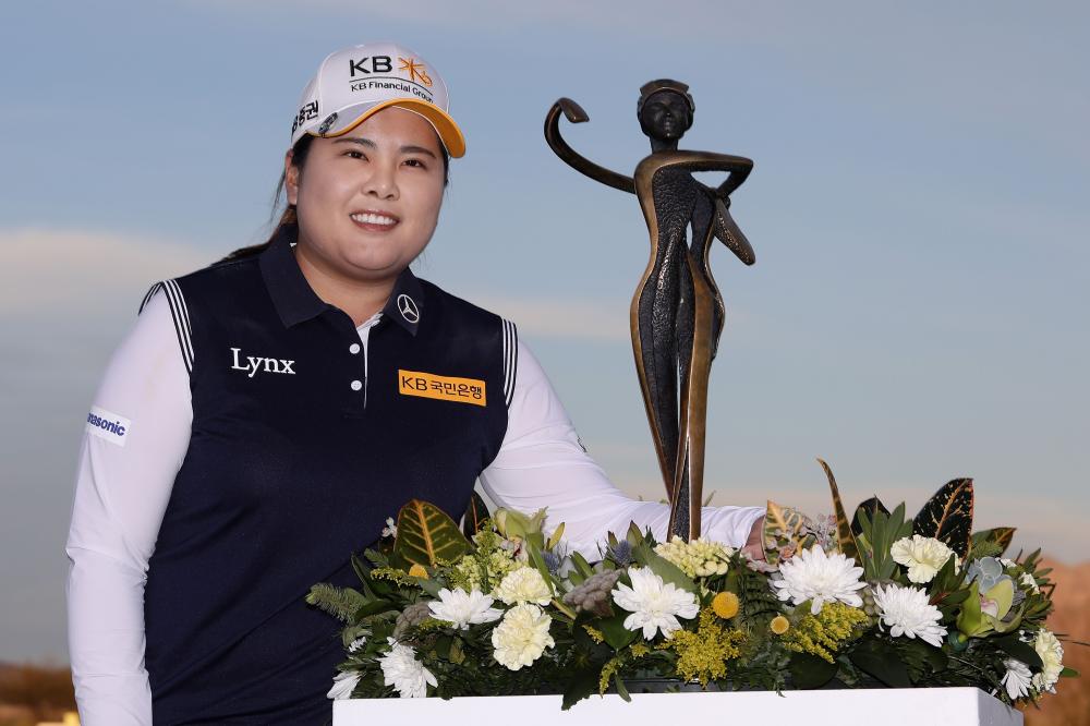 Park In-bee of South Korea poses with the trophy after winning the Bank of Hope Founders Cup at Wildfire Golf Club in Phoenix, Arizona, Sunday. — AFP