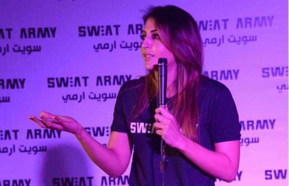 Rawan Zahran speaks at the recent launch of the Sweat Army Movement in Jeddah.