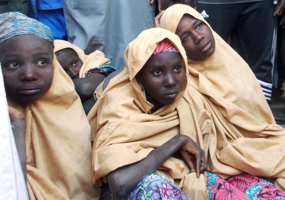 Some of the newly-released Dapchi schoolgirls are pictured in Jumbam village, Yobe State, Nigeria, on Wednesday. — Reuters