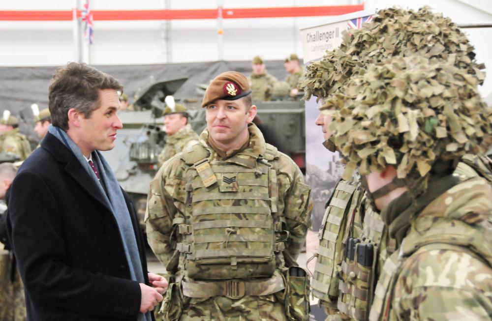 British Defense Secretary Gavin Williamson visits UK troops of the NATO Enhanced Forward Presence battle group at the military base in Tapa, Estonia, on Sunday. 