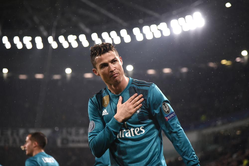 Real Madrid's Cristiano Ronaldo celebrates his second goal during the UEFA Champions League quarterfinal first leg football match against Juventus at the Allianz Stadium in Turin Tuesday. — AFP