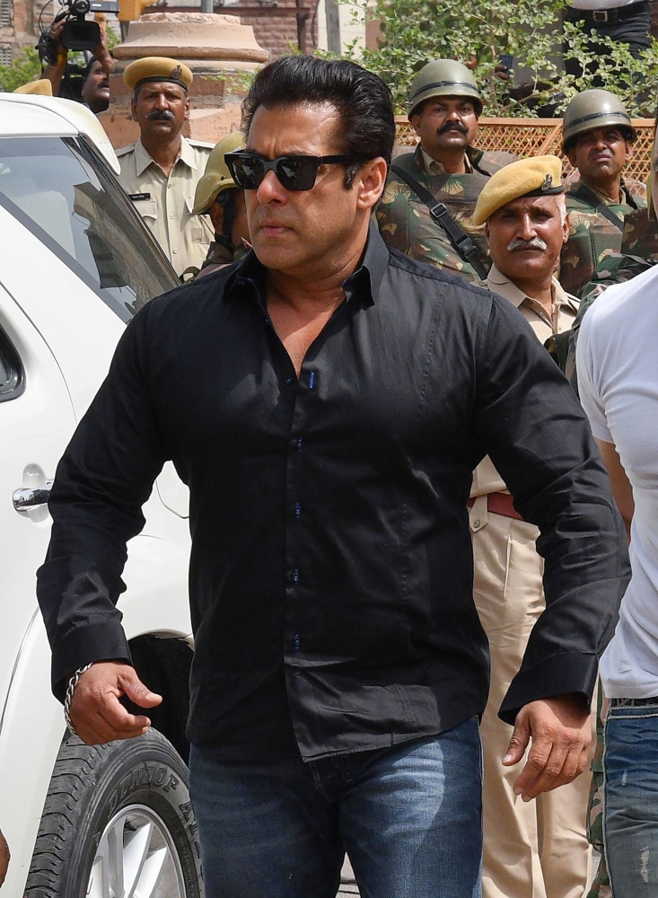 Indian Bollywood actor Salman Khan arrives at a court to hear the verdict in the long-running wildlife poaching case against him in Jodhpur on Thursday. — AFP