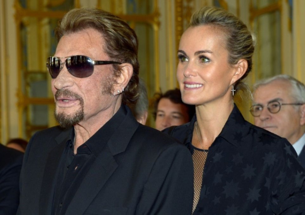 


French rocker Johnny Hallyday and his wife Laeticia are seen in this undated file photo.
