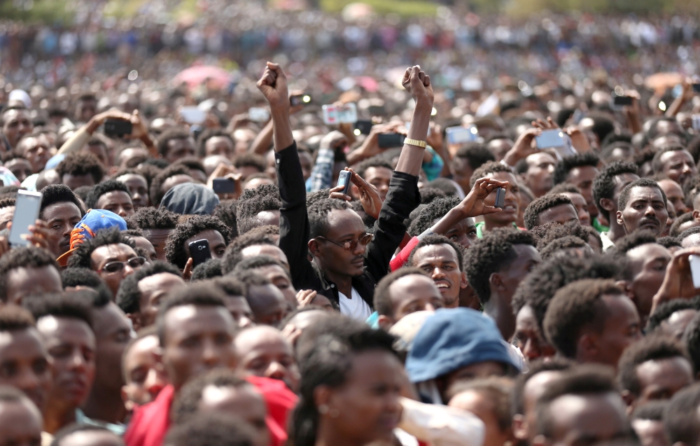 Residents attend a rally by Ethiopia’s newly elected Prime Minister Abiy Ahmed during his visit to Ambo in the Oromiya region, Ethiopia, in this April 11, 2018 file photo. — Reuters
