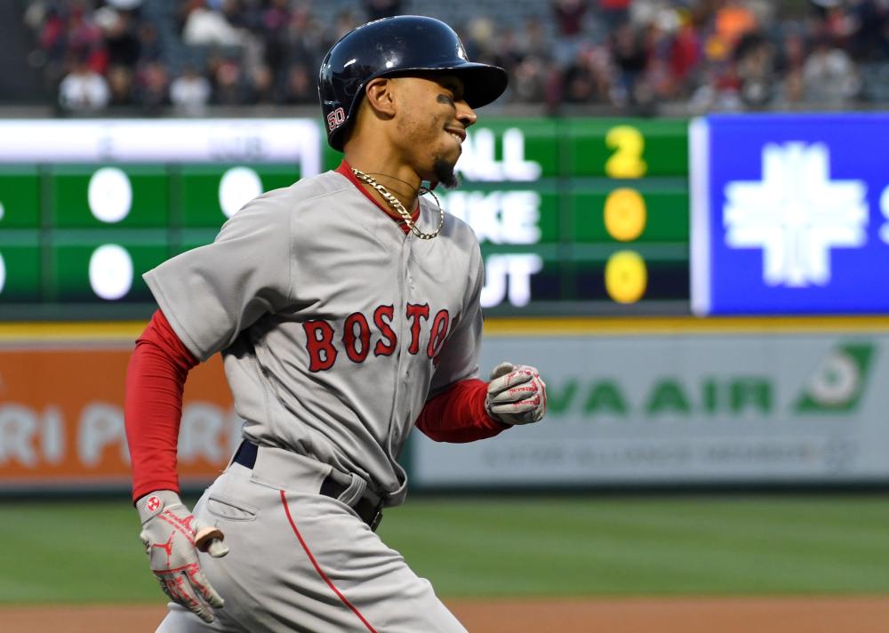 Boston Red Sox’s right fielder Mookie Betts rounds the bases after a solo home run against Los Angeles Angels at Angel Stadium of Anaheim Thursday. — Reuters