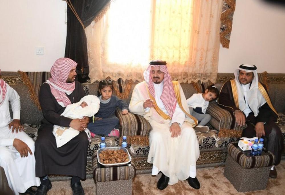 Prince Faisal Bin Khalid, emir of Asir, visits the injured security official Sultan Al-Shihri at Al-Namas General Hospital on Friday. — SPA