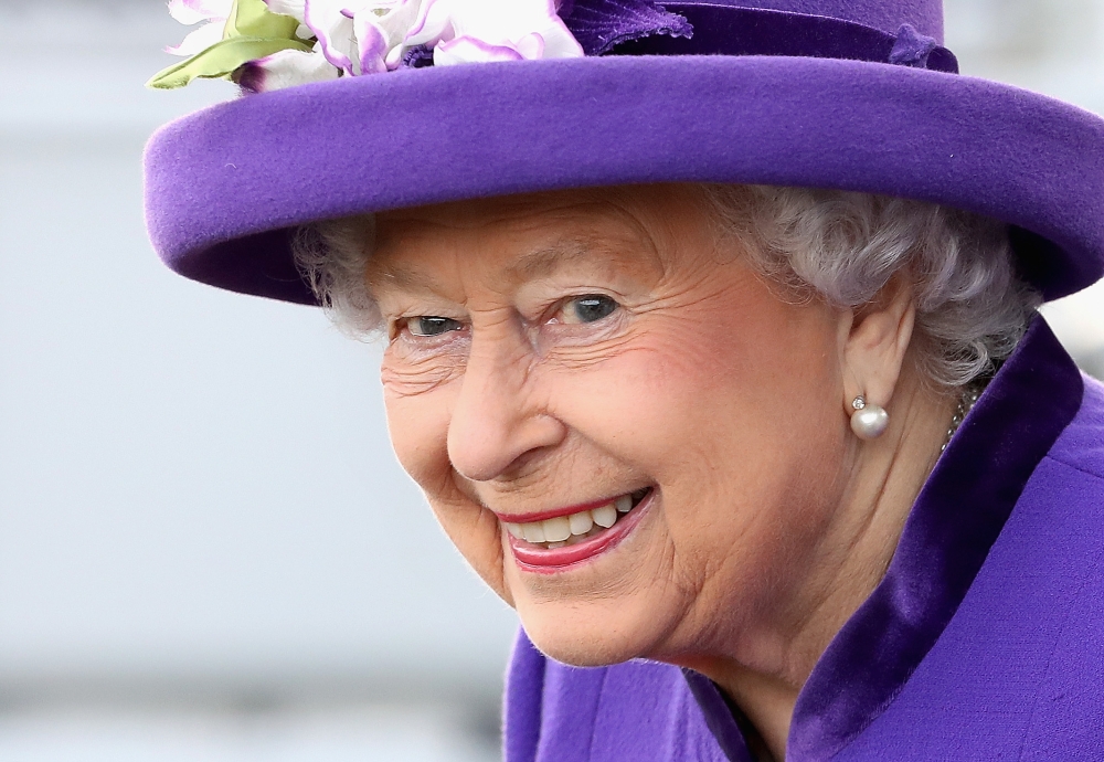 Britain’s Queen Elizabeth II attends the Commissioning Ceremony for the Royal Navy aircraft carrier HMS Queen Elizabeth at HM Naval Base in Portsmouth, southern England, in this Dec. 07, 2017 file photo. — AFP