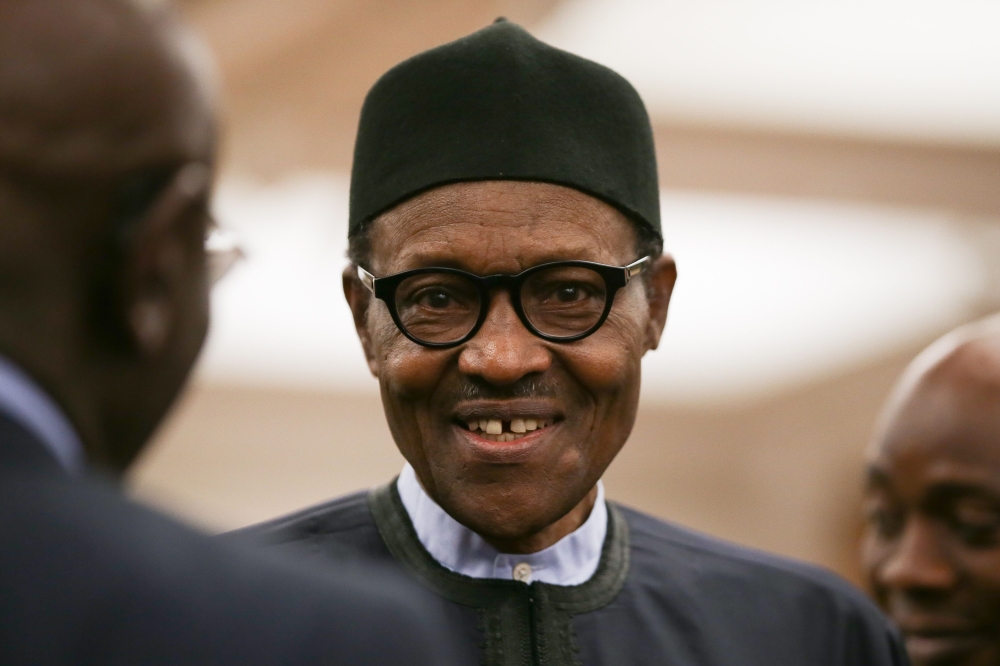 Nigeria’s President Muhammadu Buhari attends a reception at the closing session of the Commonwealth Business Forum at the Guildhall in central London on Wednesday, on the sidelines of the Commonwealth Heads of Government meeting (CHOGM). — AFP
