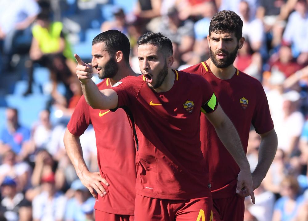 Roma's Konstantinos Manolas celebrates with teammates during their Serie A match against SPAL at Paolo Mazza, Ferrara, Italy, Saturday. — Reuters