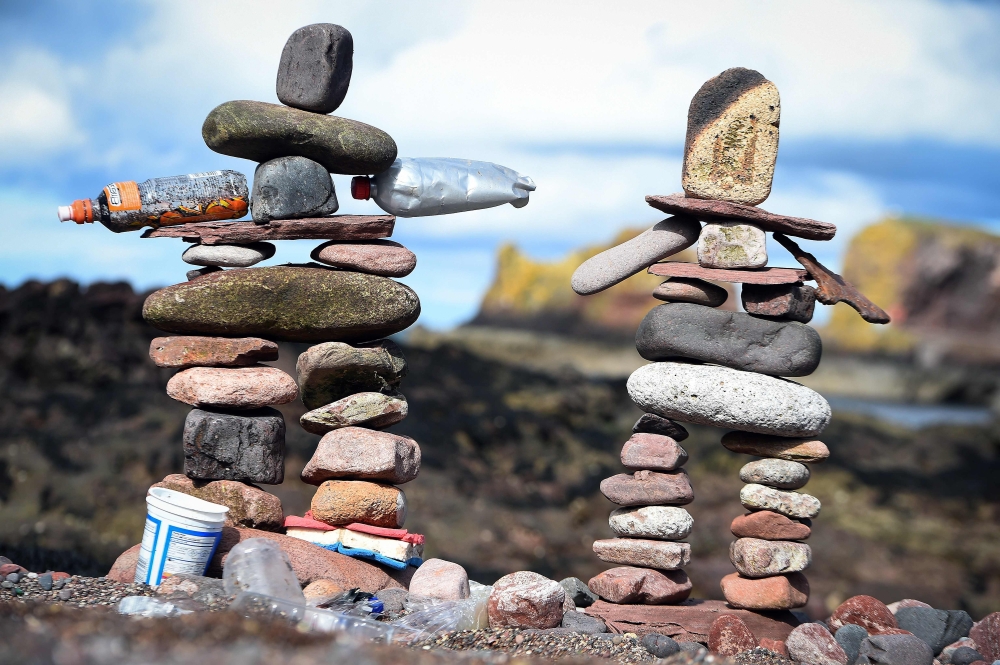 Stacked stones are pictured during the European Stone Stacking Championships 2018 in Dunbar, Scotland on Monday. - AFP