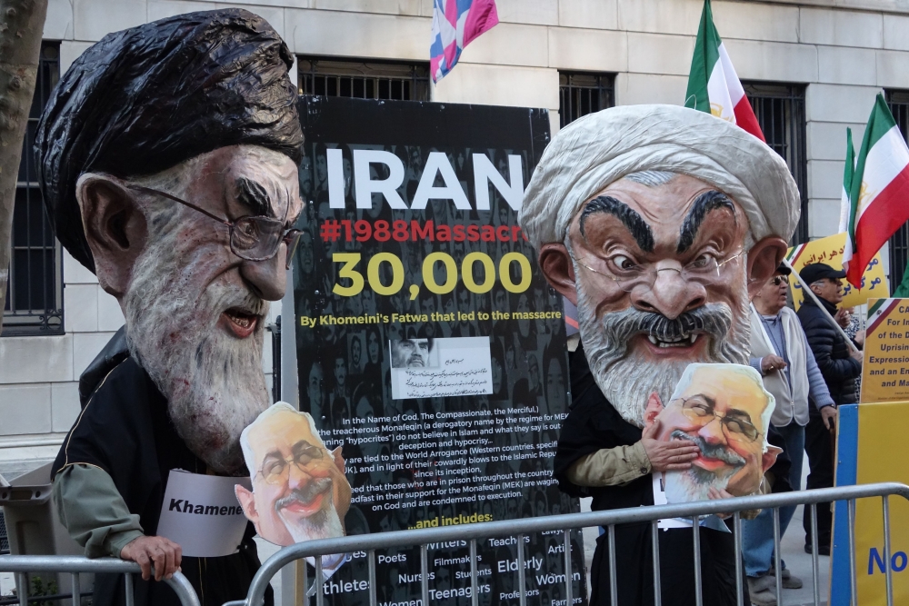 Protesters gathers across the street as Iranian Foreign Affairs Minister Mohammad Zarif speaks at the Council on Foreign Relations in New York. — AFP
