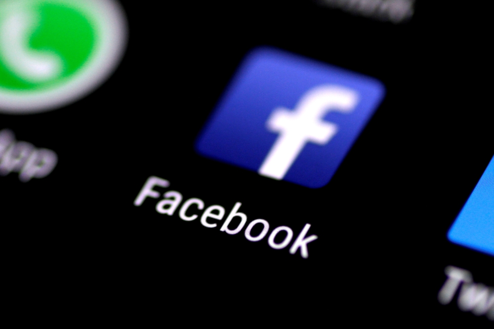 The Facebook application is seen on a phone screen in this Aug. 3, 2017 file photo. — Reuters