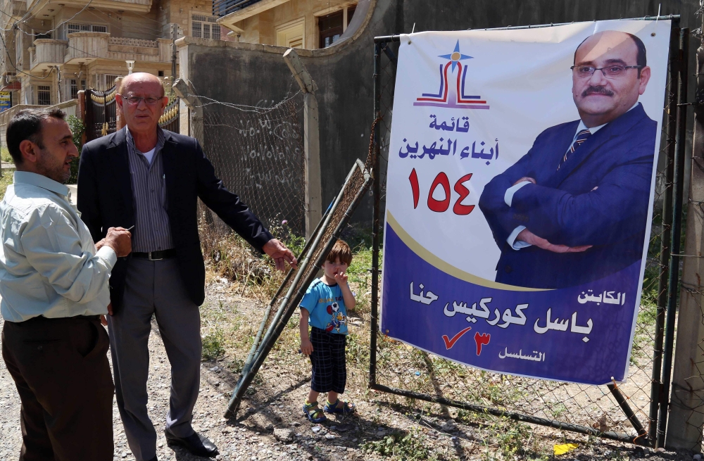 The campaign poster of Basil Gorgis, a former Iraqi footballer, hangs in a street in Irbil, the capital of the northern Iraqi Kurdish autonomous region.  — AFP