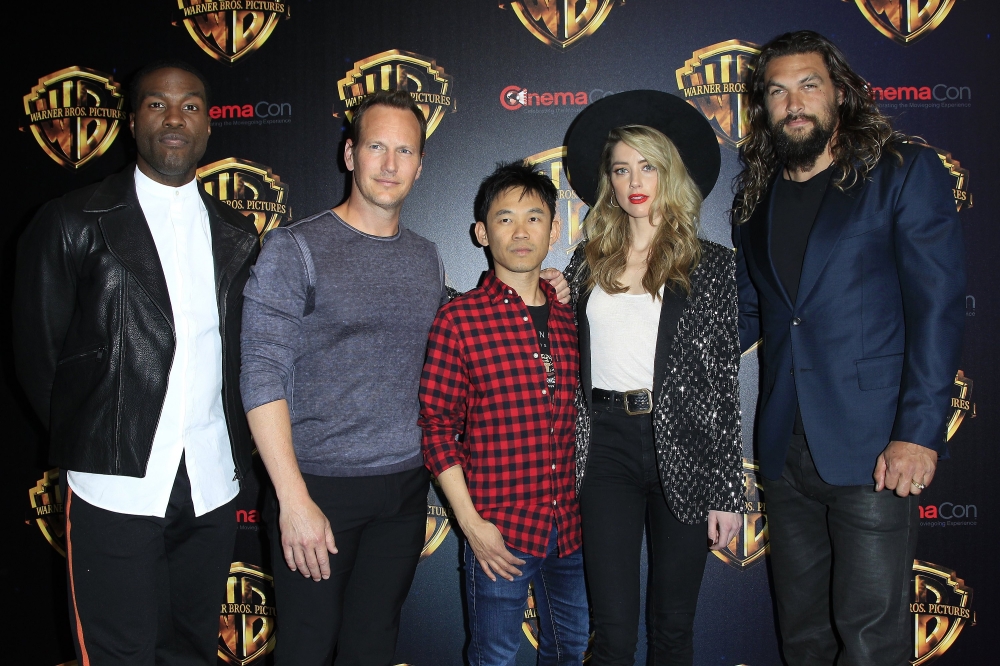 From left, actors Yahya Abdul-Mateen II, Patrick Wilson, director James Wan, actress Amber Heard and actor Jason Momoa attend a Warner Bros event at CinemaCon 2018 in The Colosseum at Caesars Palace in Las Vegas on Wednesday. - EPA