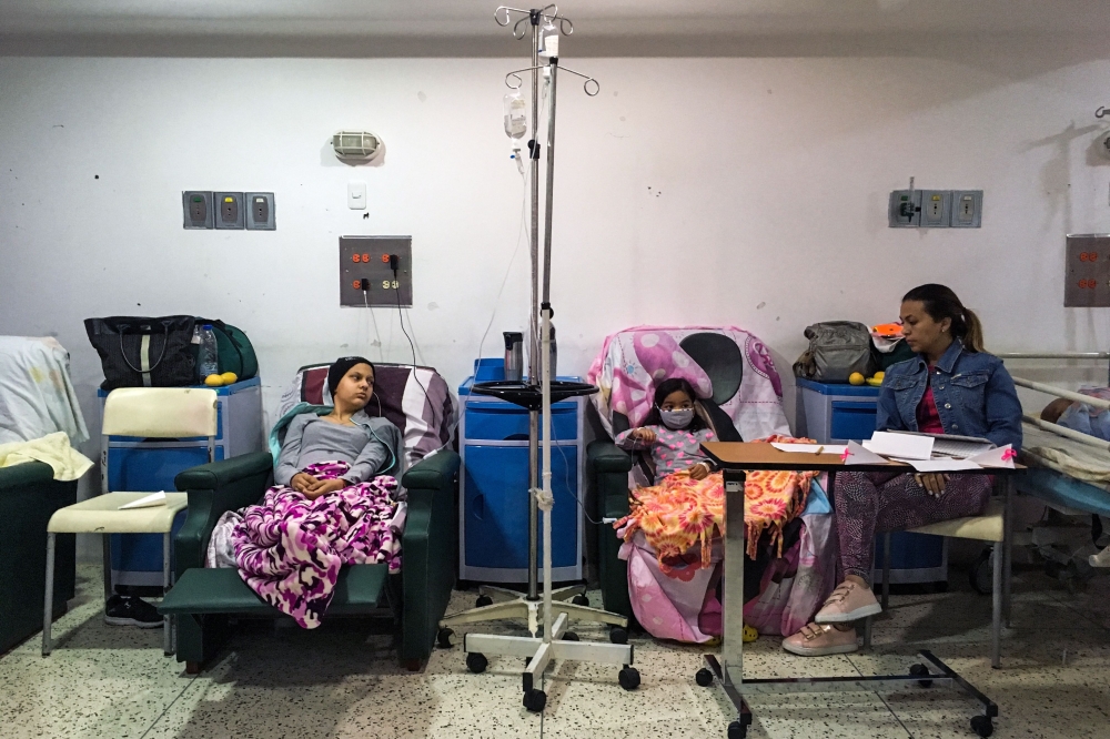 Two girls receive chemotherapy at the “Dr. JM de los Rios” Children’s Hospital in Caracas in this April 10, 2018 file photo. — AFP
