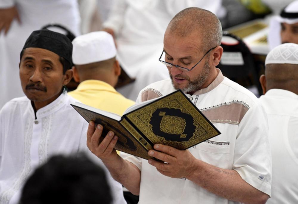 Engrossed in reading the Holy Qur’an