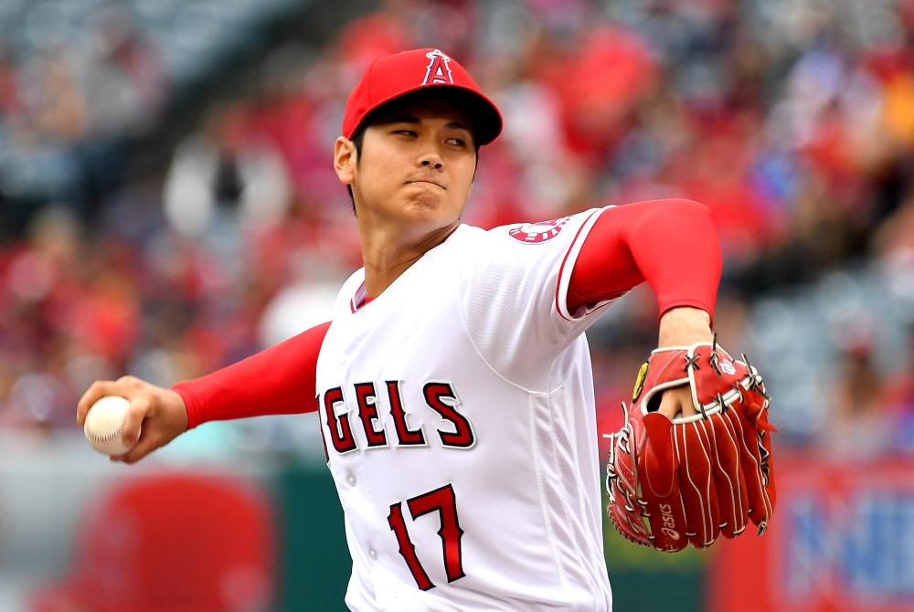Shohei Ohtani of the Los Angeles Angels pitches in the first inning of the game against the Tampa Bay Rays at Angel Stadium in Anaheim, California, Sunday. — AFP 