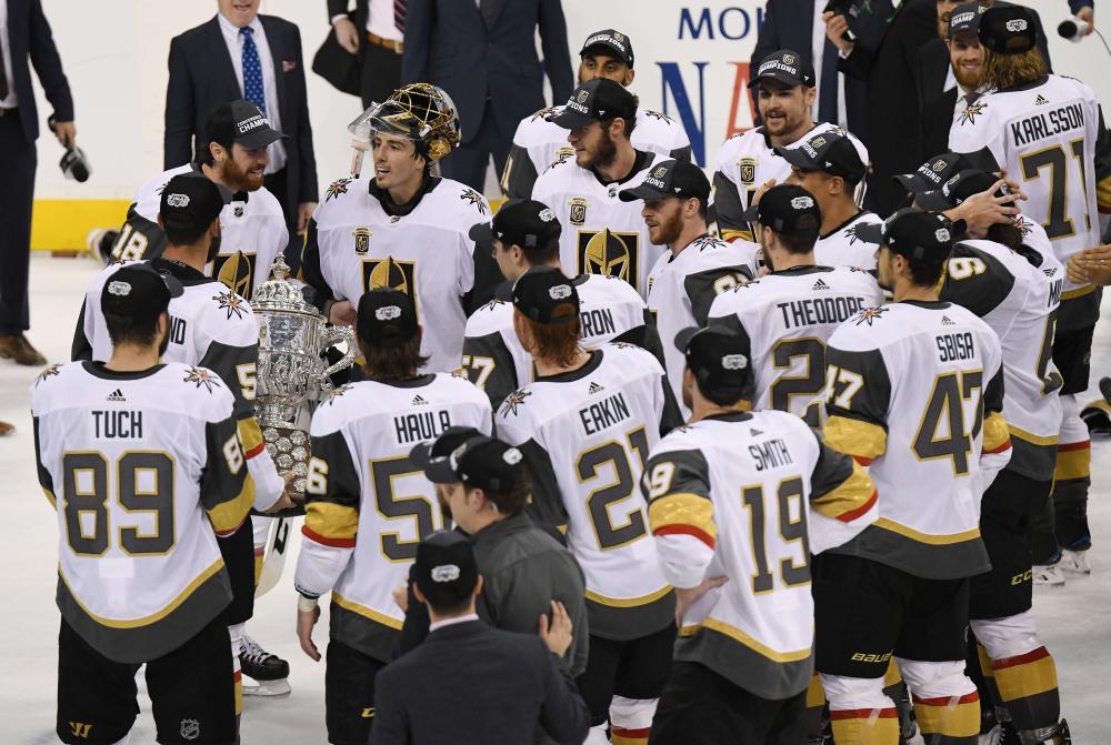The Vegas Golden Knights celebrate defeating the Winnipeg Jets 2-1 in Game 5 of the Western Conference finals to advance to the 2018 NHL Stanley Cup Finals at Bell MTS Place in Winnipeg, Canada, Sunday. — AFP