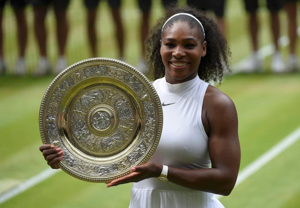 Serena Williams with Wimbledon Trophy
