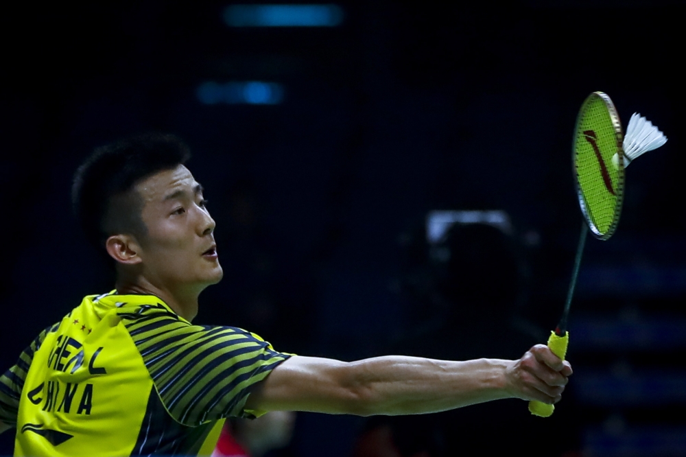 Chen Long of China in action against Chou Tien Chen of Chinese Taipei during their Thomas Cup quarterfinal match at the Thomas and Uber Cup 2018 in Bangkok, Thailand, on Thursday. — EPA
