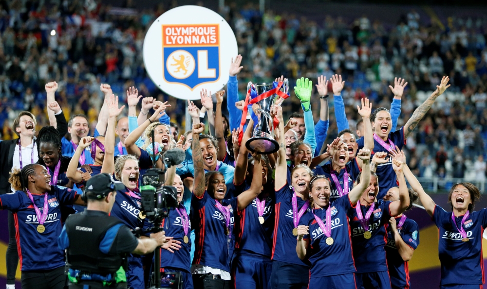 Lyon celebrates with the trophy after winning the Women's Champions League Final by beating VfL Wolfsburg at the Valeriy Lobanovskyi Stadium, Kiev, Ukraine, on Thursday. — Reuters 