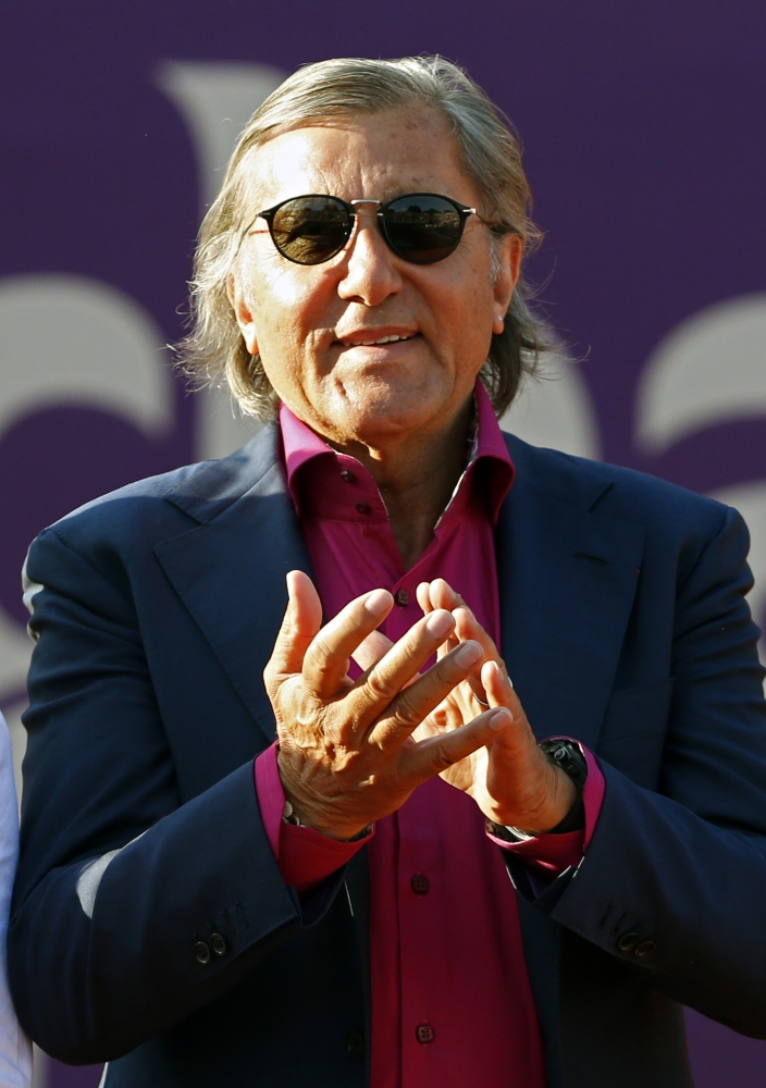 File photo shows Romanian former tennis star Ilie Nastase gesturing at the end of Bucharest Open international tennis tournament in Bucharest, Romania. Nastase was arrested on Friday two times in less than six hours, first time for suspicion of drunk-driving and refusing to take an alchool test, and second time for going on red light on a scooter while his license was suspended for his first mistake. — AFP