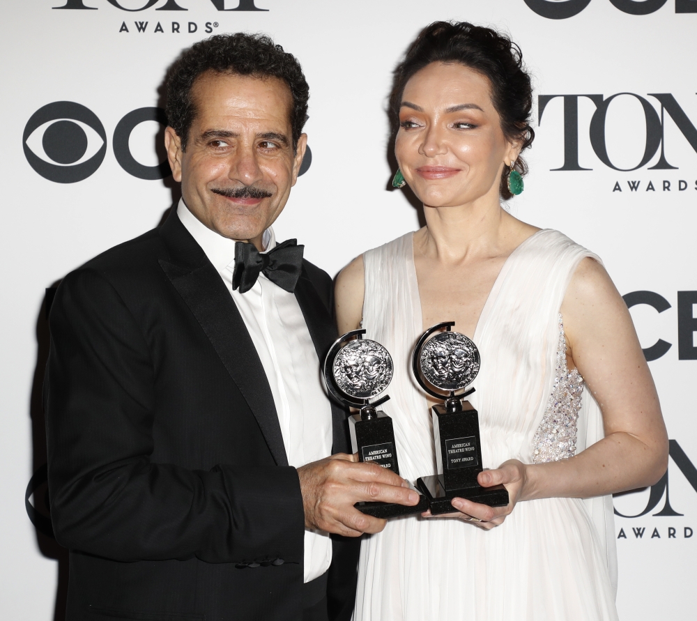 Actor Tony Shalhoub poses with his award for Best Performance by an Actor in a Leading Role in a Musical for 