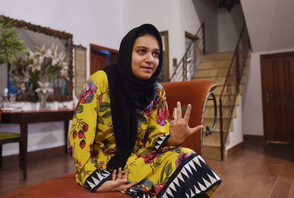 Khadeeja Siddiqui, 23, a Pakistani law student who was stabbed 23 times by a classmate after she had rejected him romantically, speaks during an interview in Lahore in this June 8, 2018 file photo. — AFP
