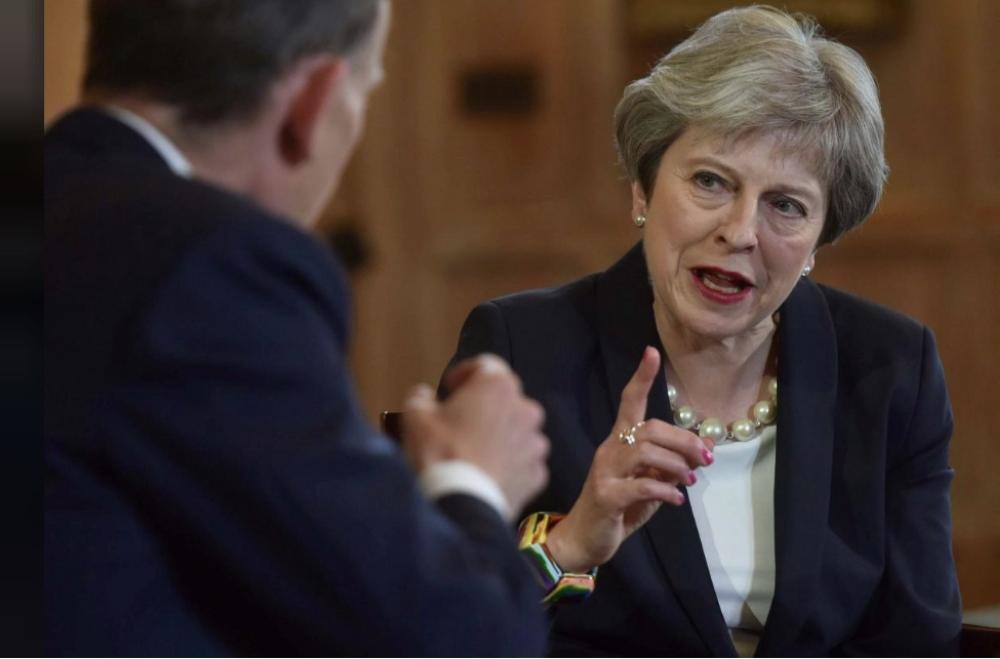 Britain's Prime Minister Theresa May speaking on the Marr Show on BBC television at her official country residence Chequers in Buckinghamshire, Britain, on Sunday. — Reuters