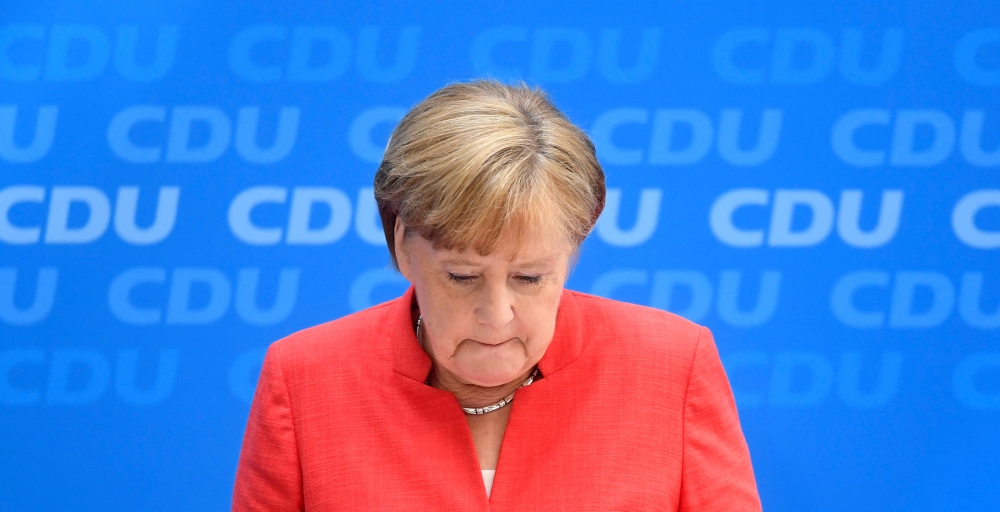 German Chancellor Angela Merkel reacts during a press conference after a Christian Democratic Union’s (CDU) board meeting at the party’s headquarters Konrad-Adenauer-Haus in Berlin on Monday. — EPA