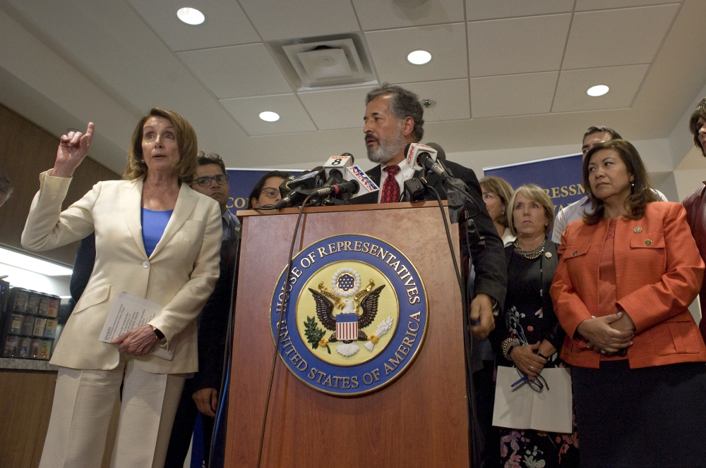 US Congresswoman House Minority Leader Nancy Pelosi, left, speaks to reporters during a press conference at the Cross Border Xpress airline terminal in San Diego, California, on Monday. — EPA